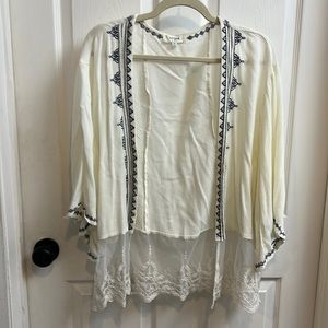 Umgee cream and navy top